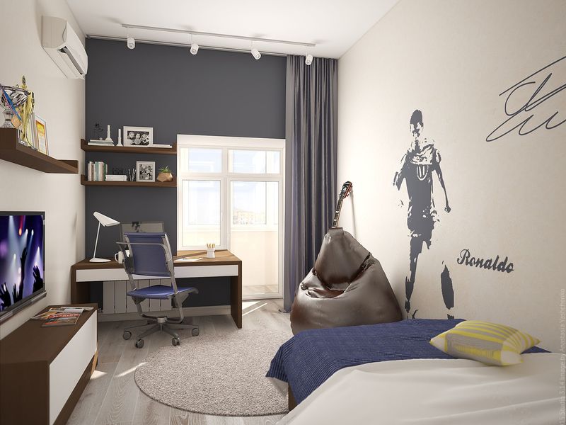 Pépinière avec un joueur de football sur le mur