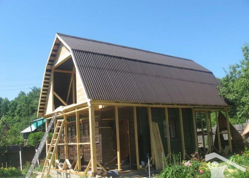 Maison au toit mansardé Maison au toit mansardé